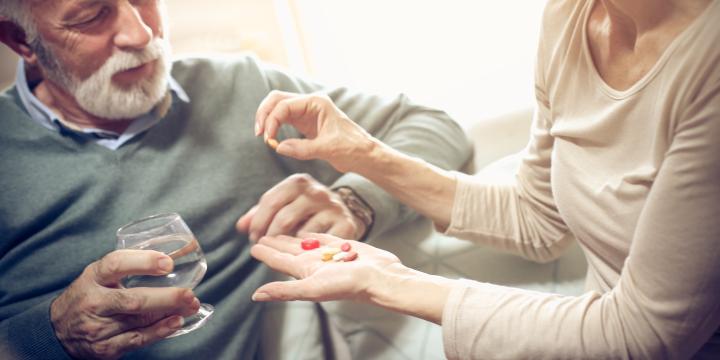 istock-man-taking-a-pill